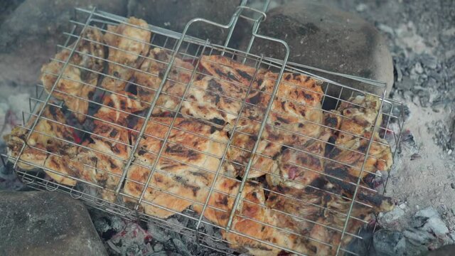 Grilled meat is grilled on charcoal.