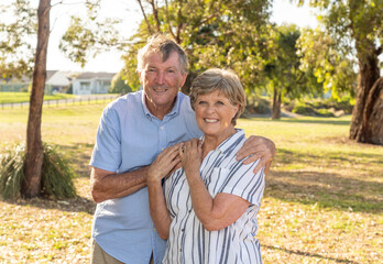 Portrait of elderly senior couple enjoying retirement lifestyle feeling happy aging together