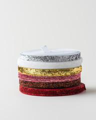 colored packing tape in rolls on colored background