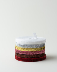 colored packing tape in rolls on colored background