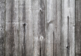 Old weathered gray wooden wall, background
