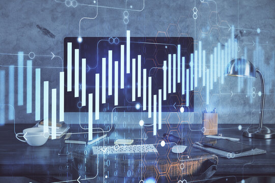 Financial graph colorful drawing and table with computer on background. Double exposure. Concept of international markets.