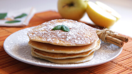 Apple pancakes with cinnamon and sugar