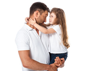 cute kid hugging handsome father isolated on white