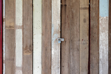 rusty padlock on wooden door old