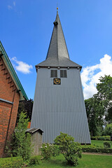 Fototapeta na wymiar Borstel: Glockenturm der Nikolaikirche (1412, Niedersachsen)