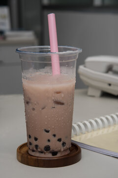 Pearl Milk Tea With A Notebook On The Desk