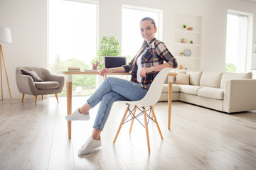Fototapeta premium Full length profile photo of young lady student notebook desktop ready wait teacher call lesson online conference study passing session remotely from house social distance quarantine indoors