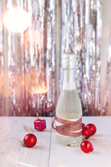Obraz na płótnie Canvas Champagne bottles on christmas background