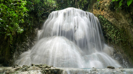 Aguinid Waterfalls and pool in the jungle near Cebu City, Philippines.