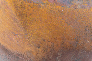 A pile of rusty metal from the roof of a burning building.