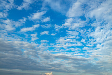 Sky with clouds background. Rare cloudscape changes into dense rainy one.