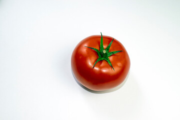 tomato on a white plate