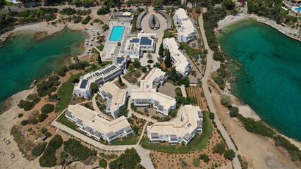 Fototapeta na wymiar Aerial drone panoramic photo of famous seaside area of Agios Aimilianos resort area, Porto Heli, Argolida, Greece