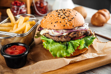 Delicious burger with lamb cutlet and vegetables © Hihitetlin