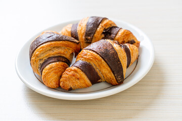 fresh croissant with chocolate