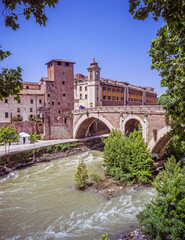 Rome Italy, view of Tiber island, bridge Fabricio and Caetani fortress tower