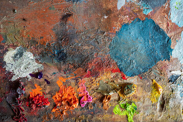 closeup of art palette with colorful paint