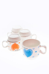 Many empty cups for coffee isolated on the white background