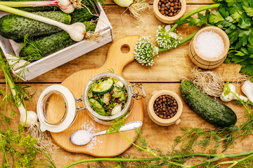 Pickling vegetables concept. Cooking process, spices, fresh fragrant herbs