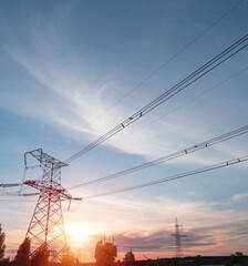 Electrical substation silhouette on the dramatic sunset background