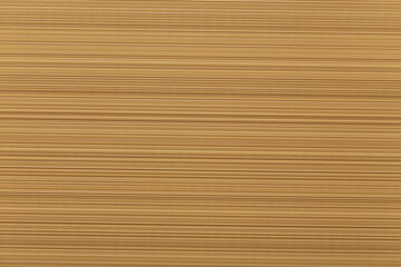 Base texture with embossed horizontal lines yellow brown. Background design with space for text.