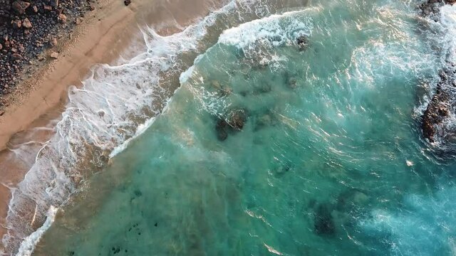 Shore, beach and coastline at sunset, El Cotillo, Fuerteventura