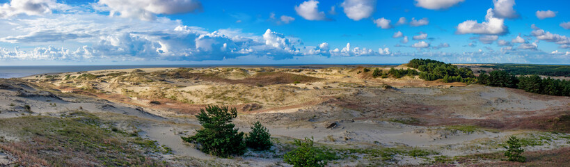 Panoramic view of sand dunes and blue sky in a summer morning. the Dune Epha's Height, Curonian...