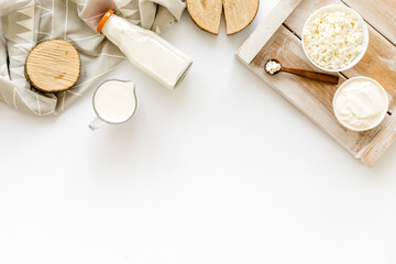 Obraz na płótnie Canvas Dairy products - cottage cheese, milk, cream - top view copy space