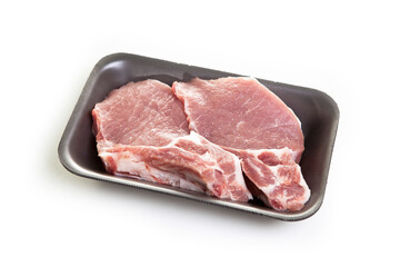 Raw pork steak in a package isolated on white background