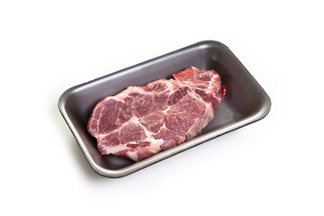 raw beef steaks in the package isolated on white background