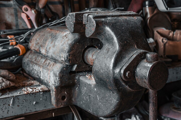 Old dirty vise on a workbench