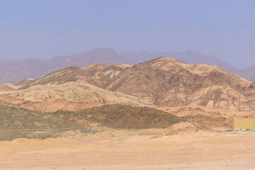 Naklejka premium wild mountains view in desert in egypt, valley, sunny landscape, summer Set Sail Champagne background