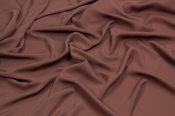 Fabric satin silk purple.  Textile folds top view