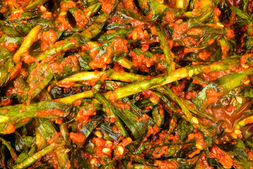 Leek kimchi on white background