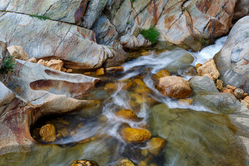 Truchillas River and rocks eroded by the passage of water. Sierra de la Cabrera, León, Spain.