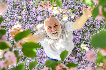 Guy enjoying life. United with nature. Good mood. Happy old age. Mental health. Happy man under...