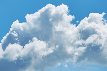 Naklejka na ściany i meble cumulus clouds on a summer day