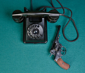 Revolver and telephone