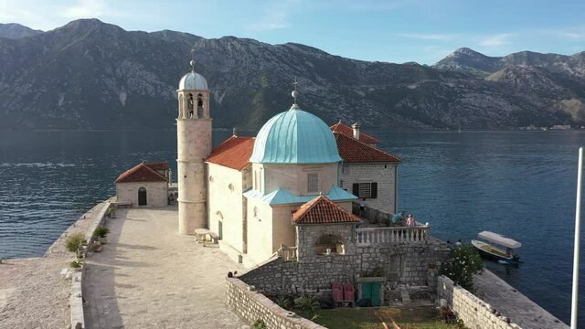 St. George and Gospa od Skrpela islands near town Perast in Montenegro. Sunset. Drone footage.