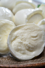 Tasty italian food, fresh white buffalo mozzarella soft cheese balls from Campania