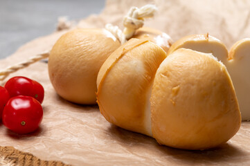 Italian semi hard handmade smoked scamorza cheese, from cow milk from Apulia or Calabria regions