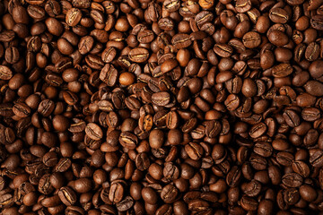 Background coffee beans. Pattern of brown roasted coffee bean beans