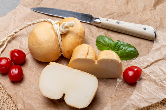 Italian semi hard handmade smoked scamorza cheese, from cow milk from Apulia or Calabria regions