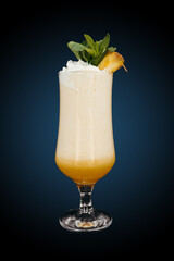 Milkshake with pineapple on blue gradient