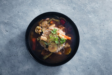 plant-based food, vegan noodles soup with mixed stir fry vegetables