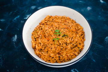 plant-based food, vegan quinoa and rice with mediterranean vegetables and red pesto