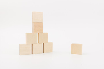Obraz premium Wooden blocks to build a wall. Concept of new business, partnership, integration and startup