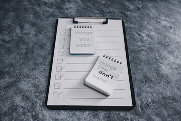 minimalism or introspection concept, notepads with texts Things you need and Things you dont need...