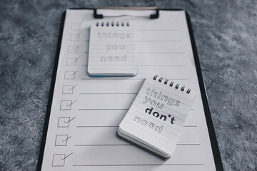 minimalism or introspection concept, notepads with texts Things you need and Things you dont need...
